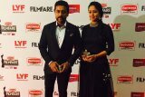 South Indian cinema's golden couple Suriya Jyothika look lovely at the Britannia FilmFare Awards (south) 2016