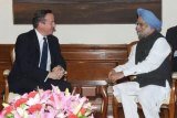 UK PM David Cameron meets Indian PM Manmohan Singh