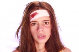 A visibly bruised and assaulted Koechlin continues to blame women for rape in It's Your Fault ad