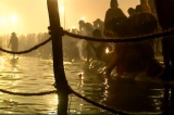 Devotees at Ganges for Maha Kumbh Mela's Mauni Amavasya Snan