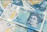 five-pound note contains animal fat - tallow and is causing outrage