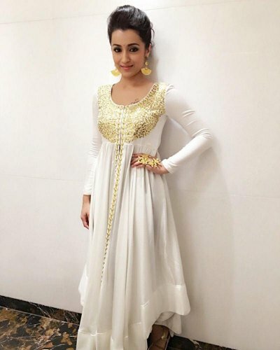 Trisha Krishnan dazzlers in white and gold for Cheekati Rajyam event