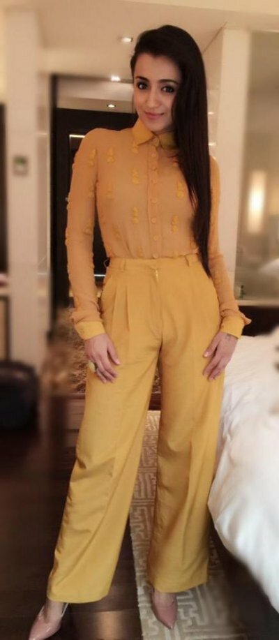 Trisha Krishnan looked chic and business-like in a mustard-yellow Poco & Jacky outfit