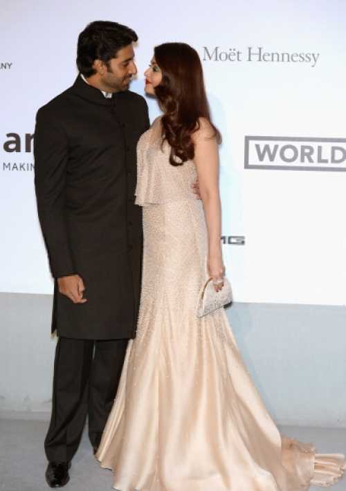 Ash wore a shimmering Armani Privé floor length gown while Abhishek looked dapper in a Manish Malhotra Sherwani