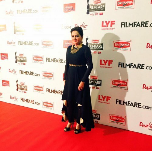 Yesteryear actor and politician Jaya Prada ravishing in black and gold at the awards ceremony red carpet