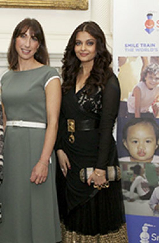 Aishwarya Rai wore a black and gold Sabyasachi lehenga-gown while Samantha Cameron wore a grey belted knee-length frock