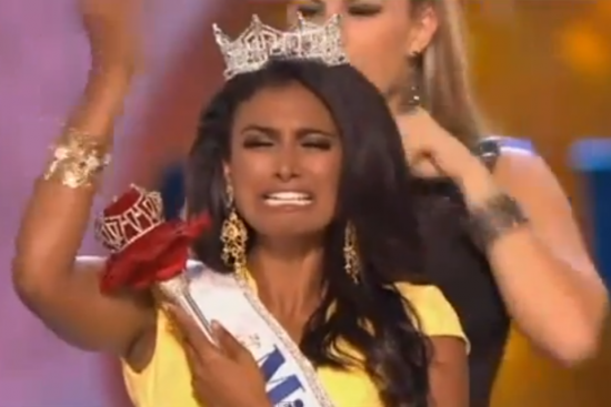 An overwhelmed Nina Davuluri after becoming first Indian American to win Miss America title