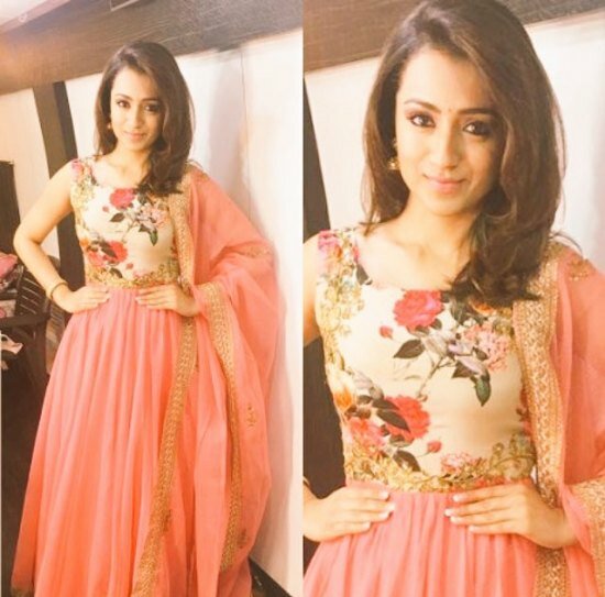 Another day of Kodi promotions, another elegant look of Trisha - this time in a peachy pink rose-print outfit