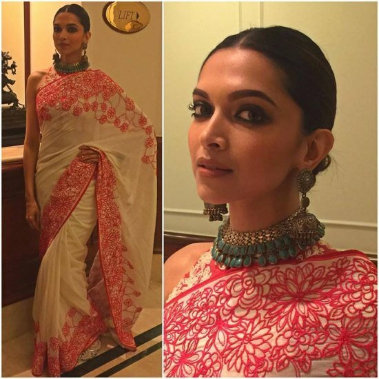Deepika wore a cream saree with red embroidery to celebrate Diwali 2015 with Ranbir Kapoor while promoting Tamasha