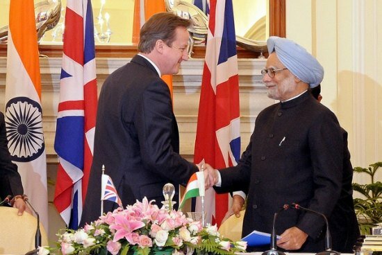Manmohan Singh and UK PM David Cameron discussing bilateral relations