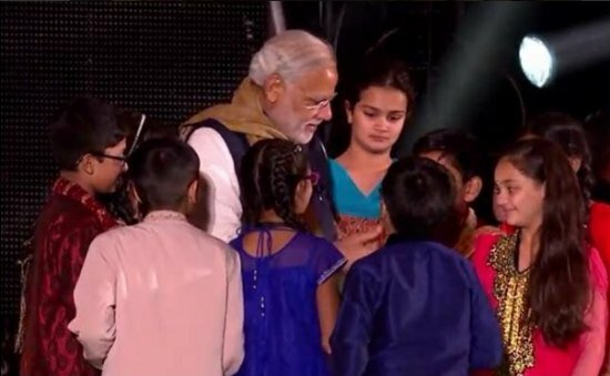 Modiji meets UK Indian children after his speech at the Wembley Community Reception