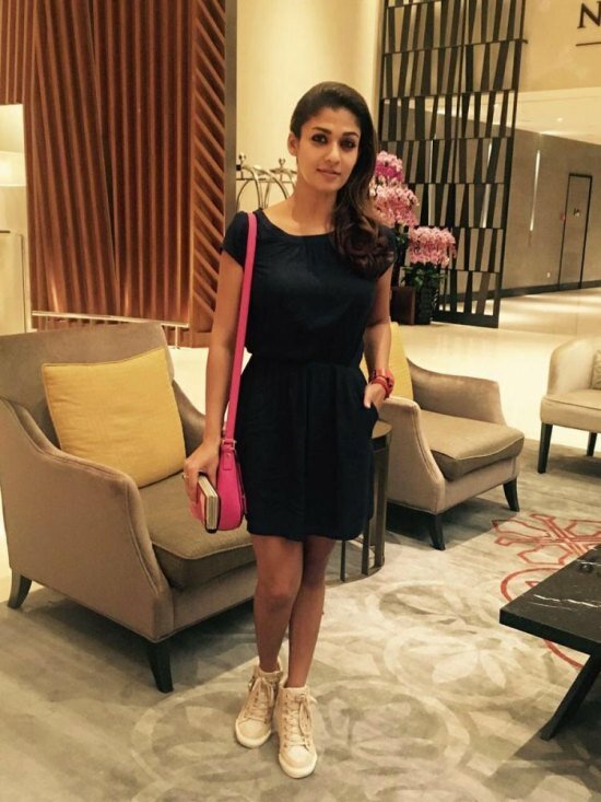 Nayanthara in a black short dress in Singapore ahead of SIIMA 2016 red carpet appearance