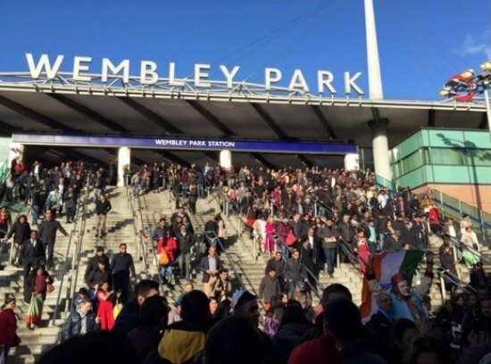 People arriving in throngs at Wembley station to go to Wembley Stadium for the event