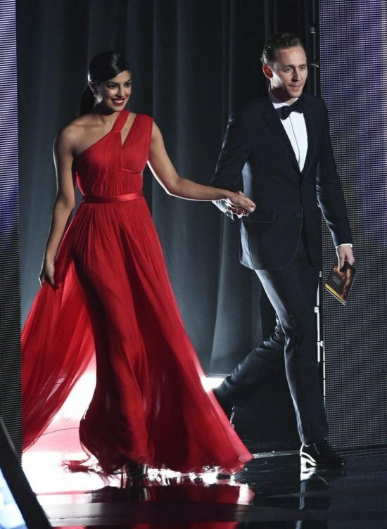 Priyanka Chopra owned the stage as she walked hand-in-hand with British actor Tom Hiddleston to present an award