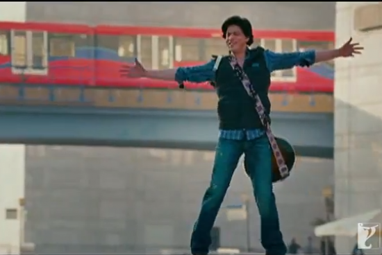 Shah Rukh Khan in checkered shirt and guitar in hand is reminiscent of Raj from DDLJ