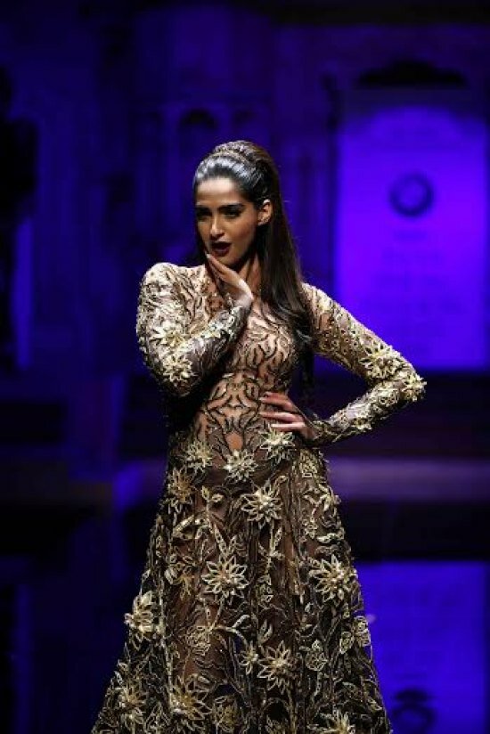 Fit for the Oscars! Sonam also wore a Black Lotus Pond gown featuring many golden 3D lotuses