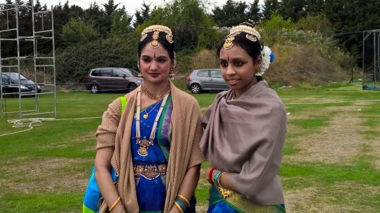 Two artists after performing on stage as part of Indian Independence Day celebrations