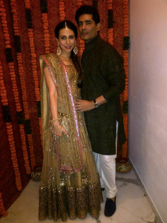 Designer Manish Malhotra and bride's sister Karisma Kapoor at the pre-wedding party