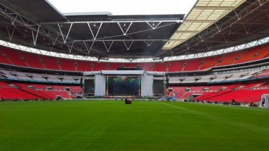 The day-light view of the stage set at Wembley to welcome PM Modi